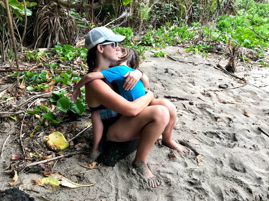 Young boy sleeping on mom at Fogama'a 